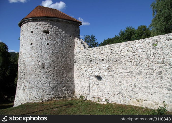 Tower and wall of fortress in Olguin, Croatia