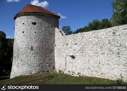 Tower and wall of fortress in Olguin, Croatia