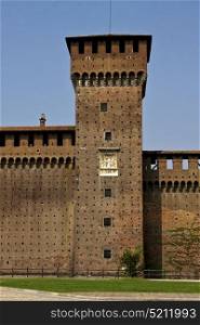 tower castle brick old brown and window in the grass of castle sforzesco milan