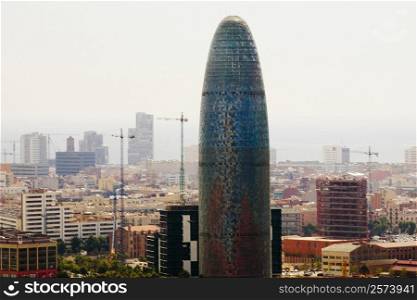 Tower in a city, Torre Agbar, Barcelona, Spain