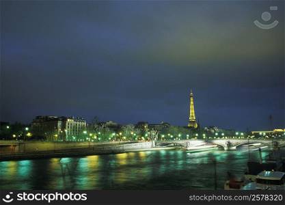 Tower lit up at night, Eiffel Tower, Paris, France