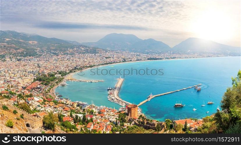 Tower of Alanya and the harbour, view from the Castle, Turkey.. Tower of Alanya and the harbour, view from the Castle, Turkey