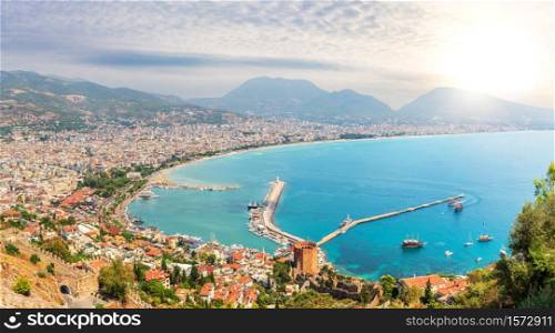Tower of Alanya and the harbour, view from the Castle, Turkey.. Tower of Alanya and the harbour, view from the Castle, Turkey