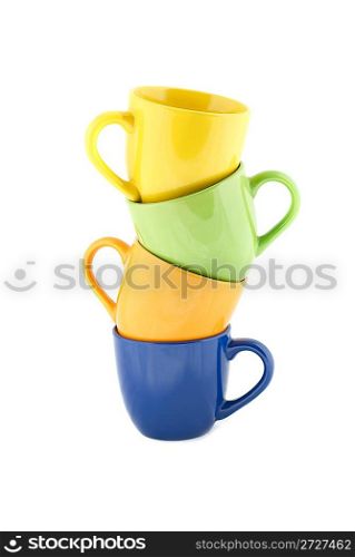 Tower of color cups isolated on white