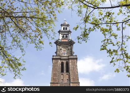 tower of westerkerk in dutch capital of amsterdam on a sunny day in spring