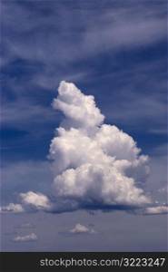Tower Shaped Cloud In A Blue Sky