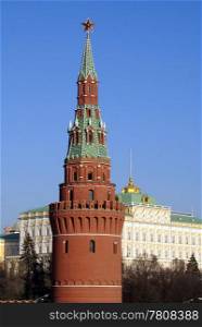 Tower with red star and big Kremlin palace, Moscow