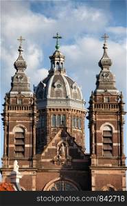 Towers and dome of 19th century Saint Nicholas Church (Dutch: Sint Nicolaaskerk) by Adrianus Bleijs in Amsterdam, Holland, Netherlands.
