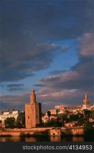 Towers in a city, Gold Tower, La Giralda, Seville, Spain