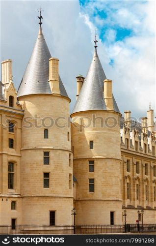 Towers of Conciergerie in sunny day, Paris, France