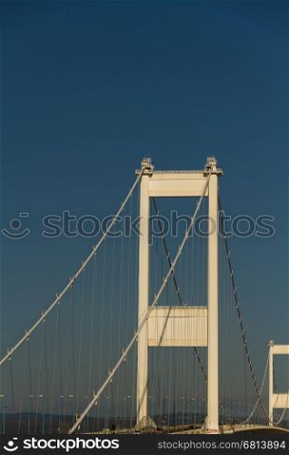 Towers of the old Severn Crossing welsh Pont Hafren bridge that crosses from England to Wales across the rivers Severn and Wye.