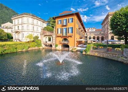 Town of Como fountain and architecture view, Como Lake, Lombardy region of Italy