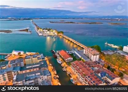 Town of Grado archipelago and bridge to mainland aerial evening view, Friuli-Venezia Giulia region of Italy