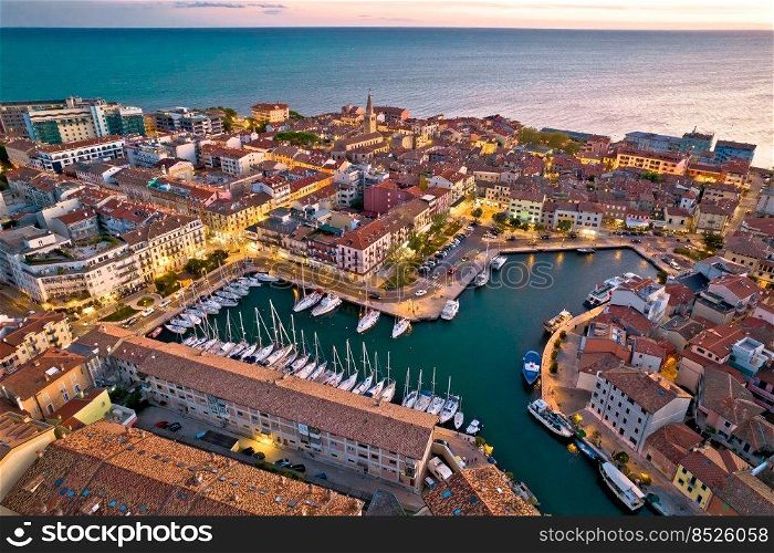 Town of Grado colorful architecture and waterfront aerial evening view, Friuli-Venezia Giulia region of Italy