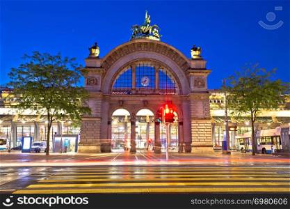 Town of Lucerne old train station arch evening view, central Switzerland