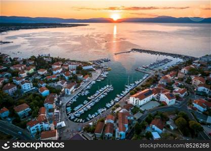 Town of Malinska aerial sunset view, Island of Krk, archipelago of Kvarner, Croatia