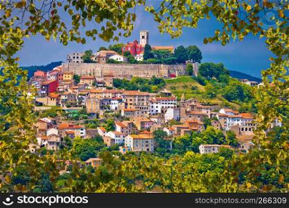 Town of Motovun on picturesque hill view through leaf frame, Istria, Croatia