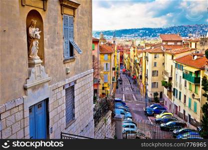 Town of Nice colorful street architecture and church view, tourist destination of French riviera, Alpes Maritimes depatment of France