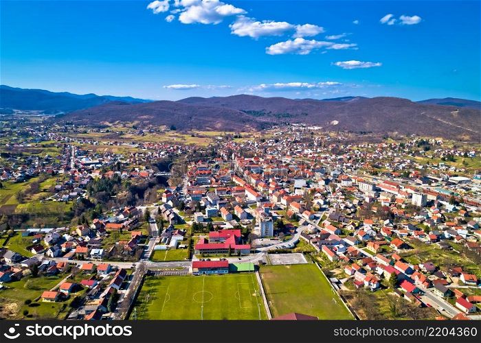 Town of Ogulin city center and Dobra river canyon aerial panoramic view, landscape of central Croatia