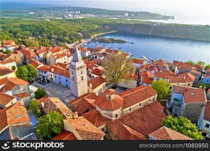 Town of Omisalj church and square aerial panoramic view, Krk island of Croatia