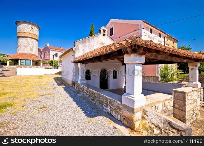 Town of Omisalj old stone square and landmarks view, Krk island in Croatia
