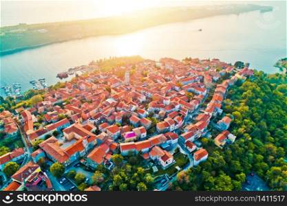 Town of Omisalj on Krk island aerial epic sunset view, Kvarner bay of Croatia