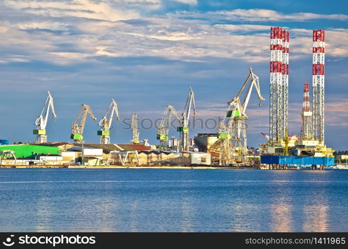 Town of Pula shipyard cranes view from the sea, Istria region of Croatia