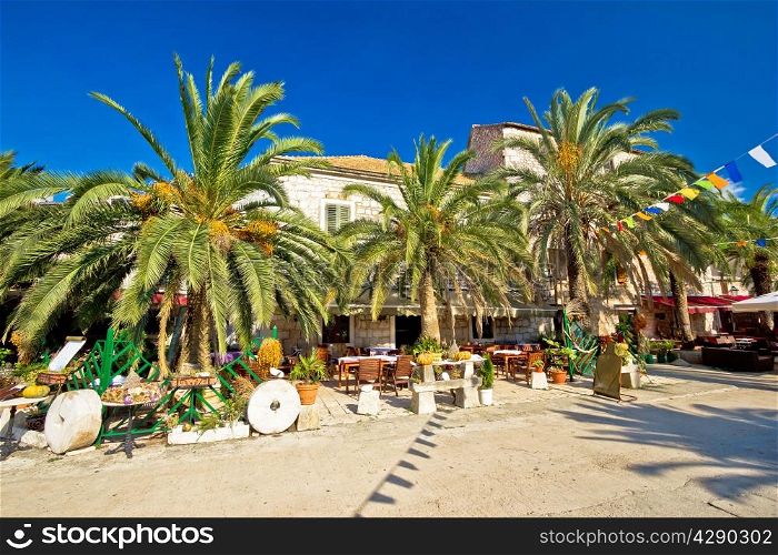 Town of Stari Grad on Hvar island waterfront palm promenade view, Dalmatia, Croatia