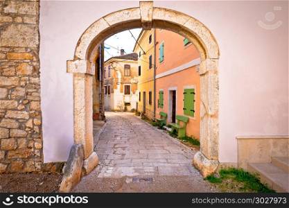 Town of Visnjan old stone gate and street, Istria region of Croatia. Town of Visnjan old stone gate and street