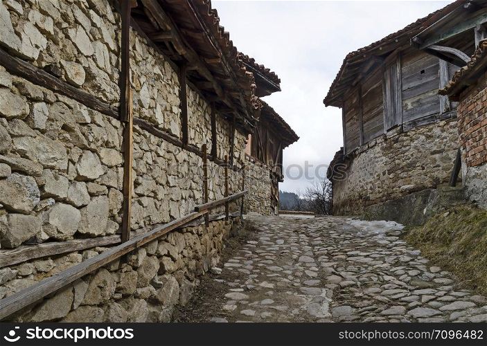 Town unique with its cobblestone streets, painted in bright colors houses with verandahs and picturesque eaves, Koprivshtitsa, Bulgaria, Europe