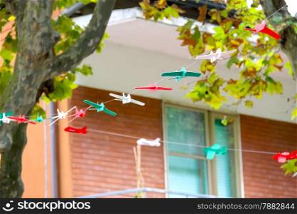 Toy airplanes decorate street in the resort town Bellaria Igea Marina, Rimini, Italy