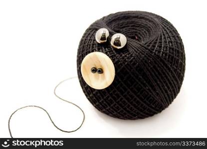 Toy balls of wool with the eyes