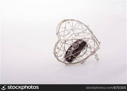 Toy car as a transportation device in a heart cage