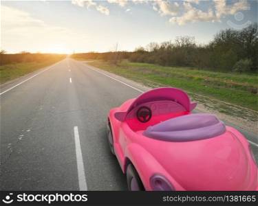 Toy car on real road. Conceptual idea design.