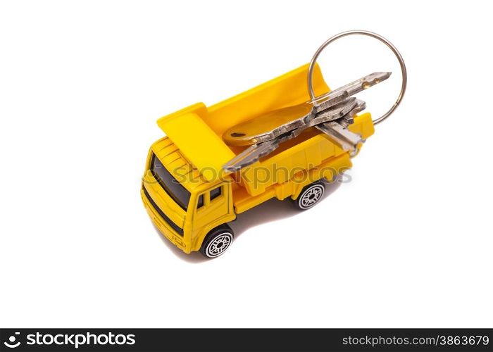 Toy car truck with keys isolated on white background