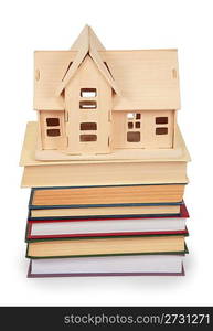 toy house on pile of books