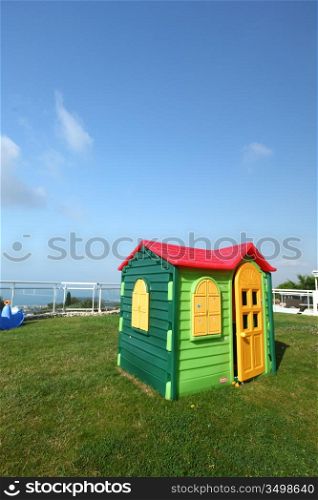 toy plastic house in mountains