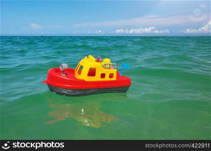 Toy ship boat and sea wave. Conceptual design.
