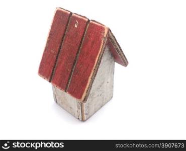 Toy wooden house on a white background