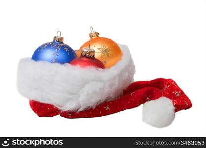 toys for the Christmas tree in Santa&acute;s hat isolated