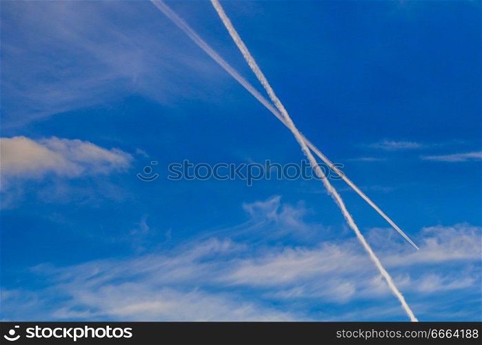 Trace of the airplane in the sky.