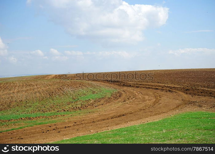 Track and plowed land in Israel