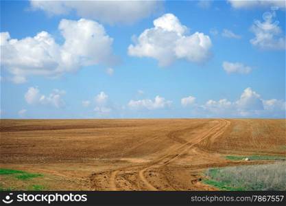 Track and plowed land in Israel