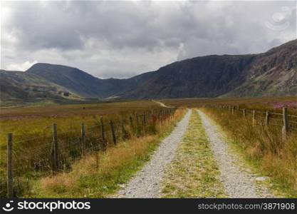 Track into Cwm Eigiau with Carnedd Mountains in the distance. Conwy, Snowdonia National park, Gwynedd, Wales, United Kingdom
