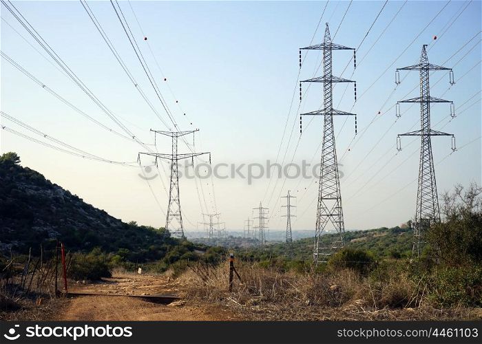 Track, pylons and wire in rural part of Israel
