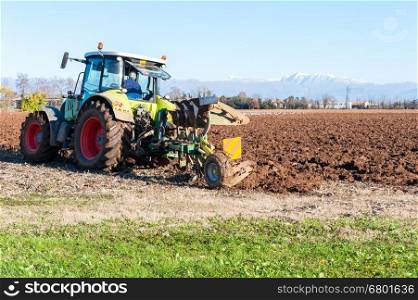 Tractor plowing the field