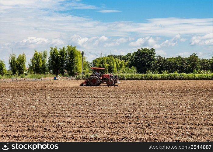 tractor working in field agriculture.