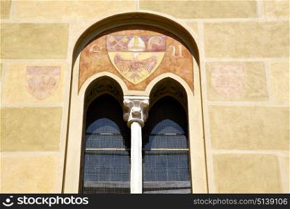 tradate varese italy abstract window monument curch mosaic in the yellow