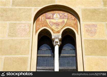 tradate varese italy abstract window monument curch mosaic in the yellow