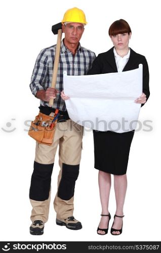 Tradesman and engineer working together